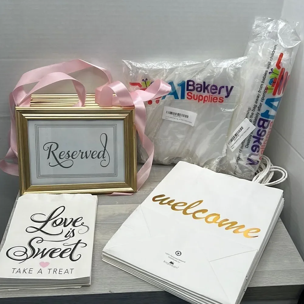 Bundle of Wedding supplies frames bags aisle bows welcome bags